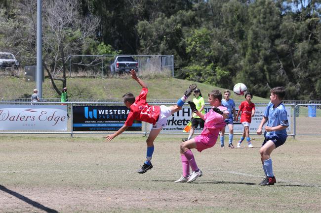 The Premier Invitational football tournament on the Gold Coast. Gold Coast Knights Red v Springfield United under-13s in action. Picture: Mike Batterham.