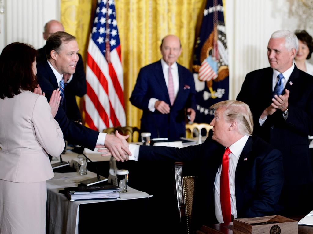 Donald Trump shakes NASA administrator Jim Bridenstine’s hand after a National Space Council meeting in 2018. Picture: Brendan Smialowski/AFP