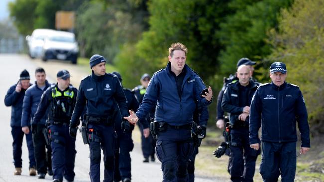 Police conduct a search in bushland on the outskirts of Cranbourne for missing man Brendon Farrell. Picture: NCA NewsWire / Andrew Henshaw