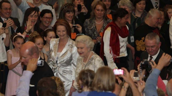 The Queen and then prime minister Julia Gillard make their way to a reception at Parliament House in Canberra in 2011. Picture: Kym Smith