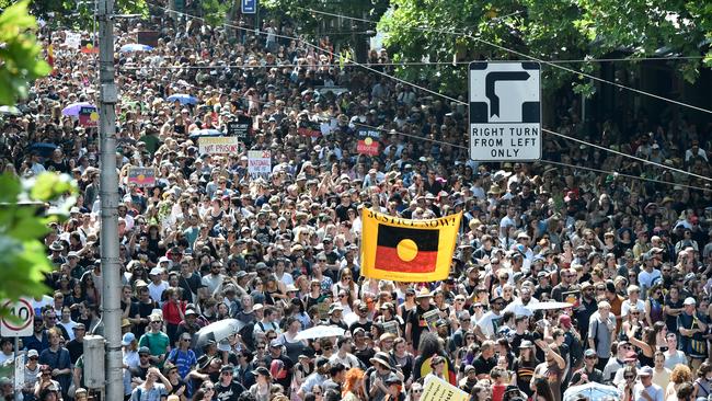 Protesters marching from Spring St to Flinders Street Station. Picture: Jason Edwards