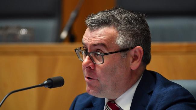 Labor Senator Murray Watt took aim at MP Stuart Robert and the Budget. (AAP Image/Mick Tsikas)