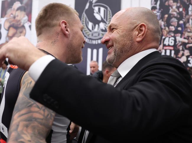 MELBOURNE, AUSTRALIA - AUGUST 03: Craig Kelly, Collingwood Magpies CEO, celebrates with Jordan De Goey of the Magpies after winning the round 21 AFL match between Collingwood Magpies and Carlton Blues at Melbourne Cricket Ground, on August 03, 2024, in Melbourne, Australia. (Photo by Daniel Pockett/Getty Images)