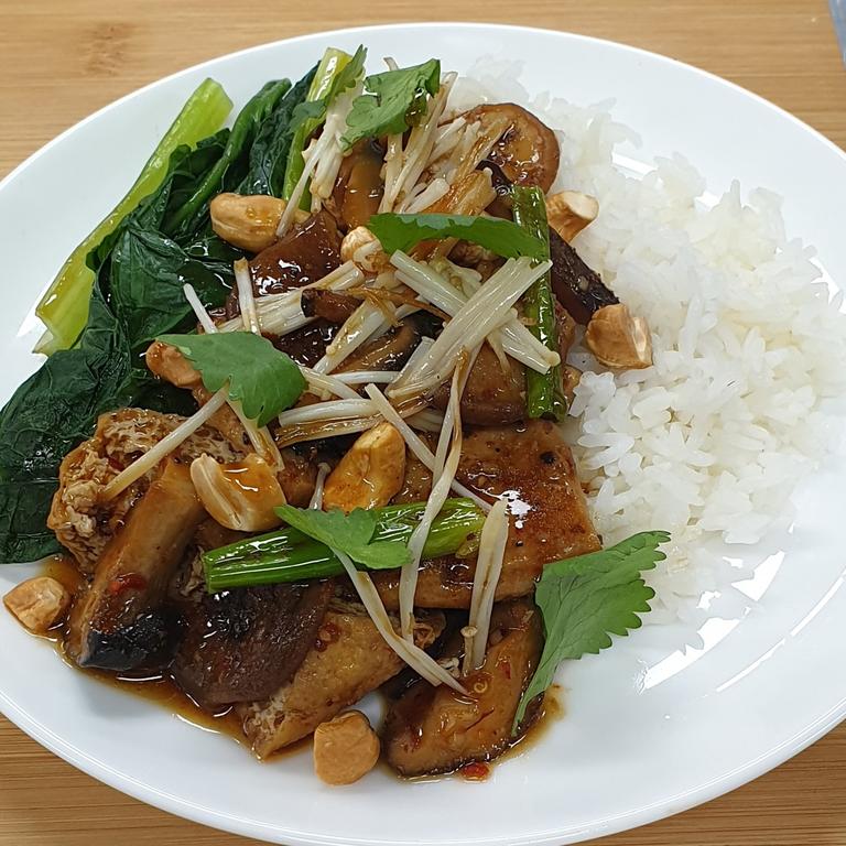 Kung pow king brown mushrooms with choy sum and jasmine rice. Picture: Qantas