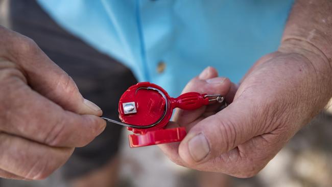 Ross Bain created the Hook-Eze product, a tool to make fishing knots easier and faster to tie. Picture: Mark Cranitch.