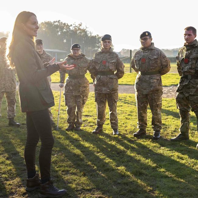 Kate talks with serving personnel to hear their experiences in the armed forces. Picture: Twitter/@kensingtonroyal