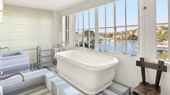 The home lets the occupants soak in the glorious view while soaking in the tub: realestate.com.au