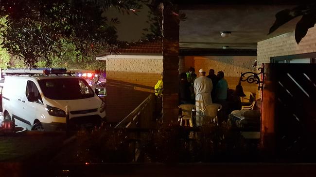 Residents were told to stay inside as responders attempted to reach the man. Picture: Steve Tyson