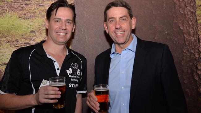 Monkey Tree owner Dean Forte, right, shows off a boutique brew to State Development Minister Cameron Dick at his Compton Rd, Underwood, brewery. PHOTO: JUDITH KERR