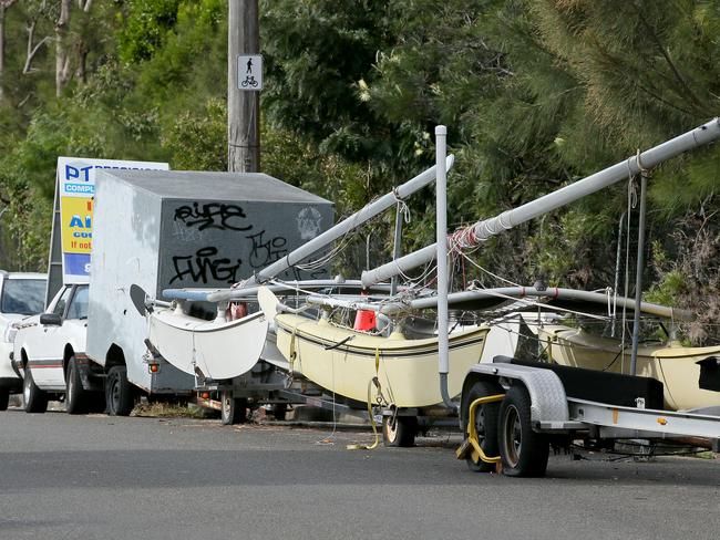 Slashed tyres on boat trailers parked along Kenneth Rd at Manly Vale last year. Picture: Troy Snook.