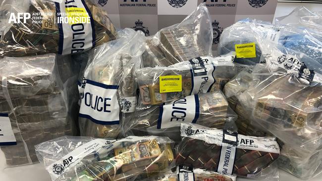 Bags of cash found by the AFP as part of the special operation. Picture: AFP