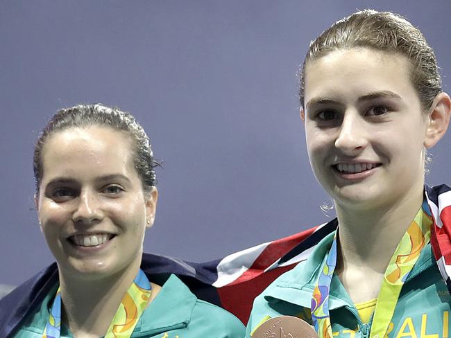 Bronze medalists from Australia, Maddison Keeney and Anabelle Smith, pose with their medals after the women's synchronized 3-meter springboard diving final in the Maria Lenk Aquatic Center at the 2016 Summer Olympics in Rio de Janeiro, Brazil, Sunday, Aug. 7, 2016. (AP Photo/Wong Maye-E)