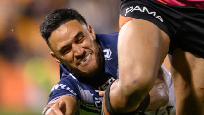 SYDNEY, AUSTRALIA - AUGUST 01: Valentine Holmes of the Cowboys attempts to tackle Solomona Faataape of the Tigers during the round 22 NRL match between Wests Tigers and North Queensland Cowboys at Leichhardt Oval, on August 01, 2024, in Sydney, Australia. (Photo by James Gourley/Getty Images)