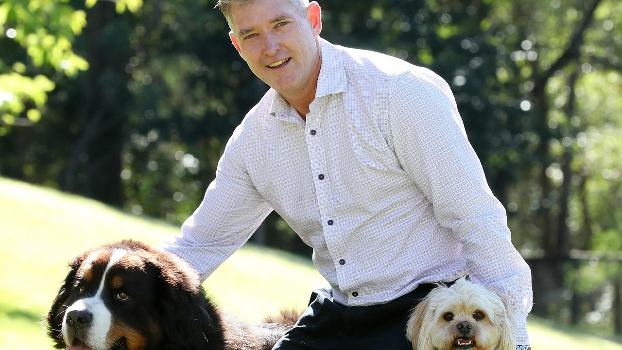 Greencross founder Glen Richards at home with his dogs Beau and Alfie,