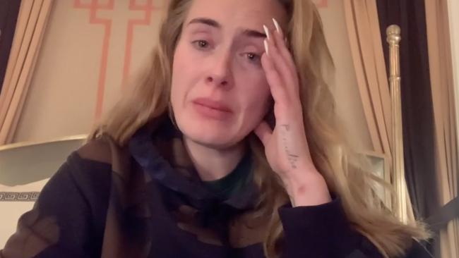 Adele tearfully announces her Vegas postponement.