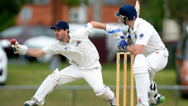 Premier Cricket: Dandenong v Prahran at Shepley Oval. Dandenong keeper Rob Hearn and Prahran batsman James Miller in action.