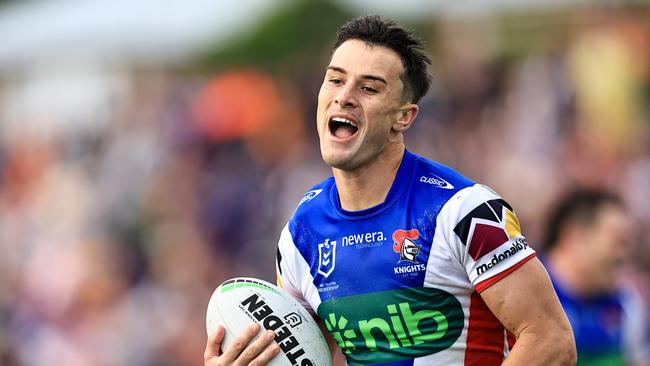 David Armstrong scores for the Newcastle Knights against Wests Tigers. Picture: Getty Images