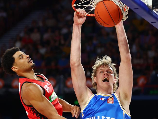 Rocco Zikarsky dunks during the round nine NBL match between Brisbane Bullets and Perth Wildcats at Brisbane Entertainment Centre. Photo: Chris Hyde/Getty Images.