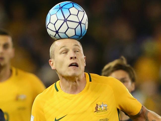 MELBOURNE, AUSTRALIA - OCTOBER 11: Aaron Mooy of the Socceroos heads the ball during the 2018 FIFA World Cup Qualifier match between the Australian Socceroos and Japan at Etihad Stadium on October 11, 2016 in Melbourne, Australia. (Photo by Michael Dodge/Getty Images)