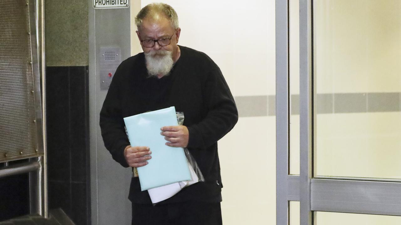 High profile lawyer Michael Bosscher leaves the Brisbane Watch House on Tuesday night. Picture: Lachie Millard.