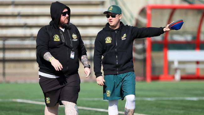 Coach Connor Brewster (right) is impressed with the level of gridiron talent in Australia. Picture: Damian Clark