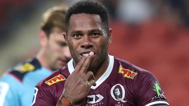 BRISBANE, AUSTRALIA - FEBRUARY 19: Filipo Daugunu of the Reds celebrates a try during the round one Super Rugby AU match between the Reds and the Waratahs at Suncorp Stadium, on February 19, 2021, in Brisbane, Australia. (Photo by Jono Searle/Getty Images)