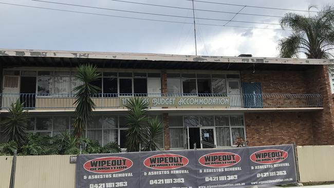 The Sunset Strip Holiday Lodge on Boundary St, Coolangatta, is knocked down on November 13, 2020. Photo: Timothy Hend