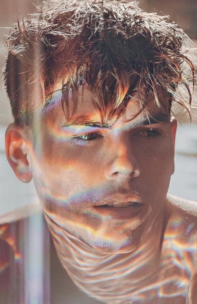 Joshua Griffen rose to TikTok fame thanks to his unearthly photography. The digital artist spreads glitter, colour, and light across curated feeds, and teaches his followers how to recreate his top shots at home. Picture: Supplied