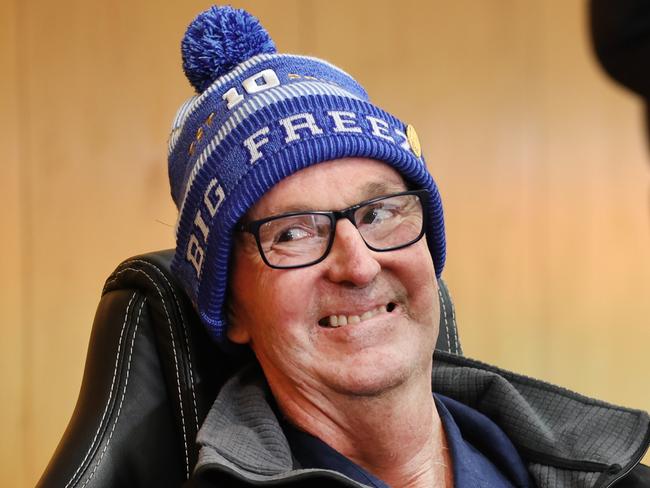 Neale Daniher with Essendon football club players at the clubhouse Hanger ahead of Freeze at the G. Neale Daniher laughs at his brother Terry as he talks of life on the farm growing up.                        Picture: David Caird