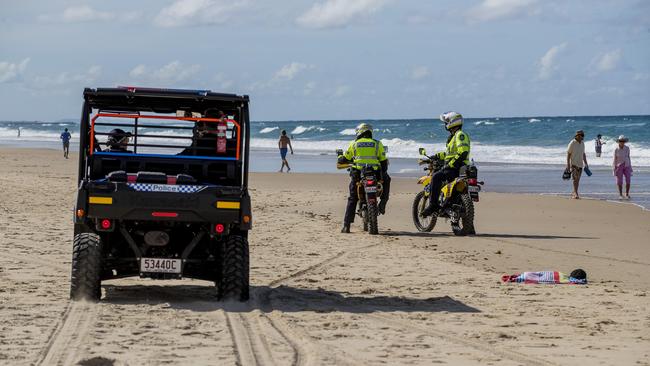 Police patrolling the beach in Surfers Paradise. Picture: Jerad Williams.