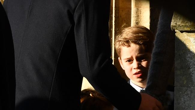 Britain's Prince George of Cambridge arrives for the Royal Family's traditional Christmas Day service at St Mary Magdalene Church in Sandringham, Norfolk, eastern England. Picture: Ben Stansall / AFP