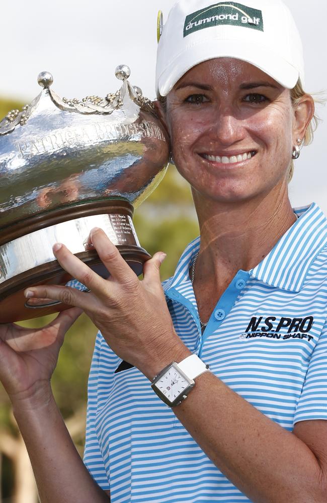 Women's Australian Open Final round at Victoria Golf Club. Karrie Webb with the Australian Open trophy after winning today. Pic Michael Klein.. Sunday Febuary 16, 2014.