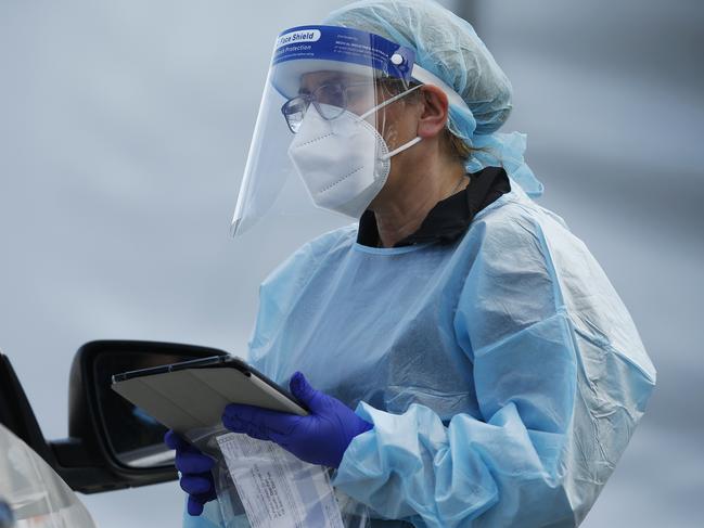 MELBOURNE, AUSTRALIA - NewsWire Photos SEPTEMBER 18, 2020:   Health workers are seen in full PPE at a pop-up COVID19 test site in Clyde, Melbourne, Victoria. Picture: NCA NewsWire / Daniel Pockett