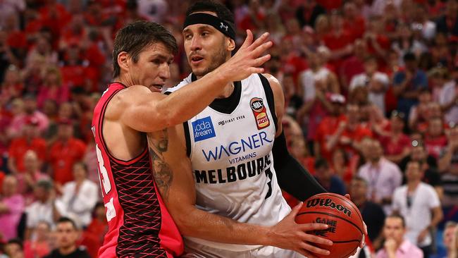 Josh Boone takes on Damian Martin.