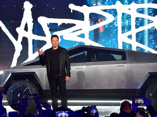 Elon Musk and his beloved Cybertruck. Picture: AFP