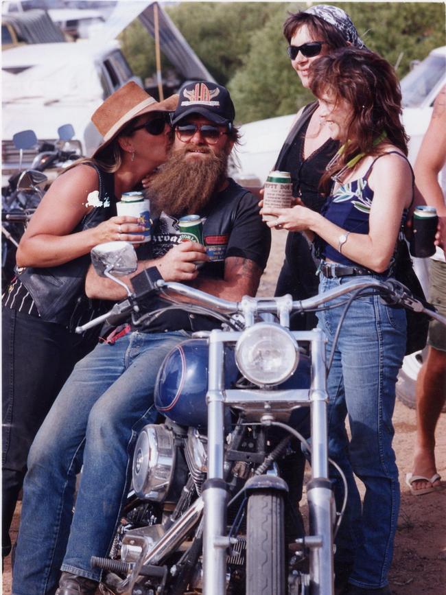 John Picton of Broken Hill gets attention from (l-r) Karen, Chris and Debaura. 22 Feb 1992.