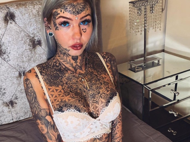 Amber has had 200 tattoos on her body, had her tongue split and her earlobes stretched. Picture: amber__luke/Instagram