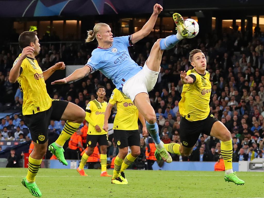  Erling Haaland in action for Manchester City during a match against Borussia Dortmund.