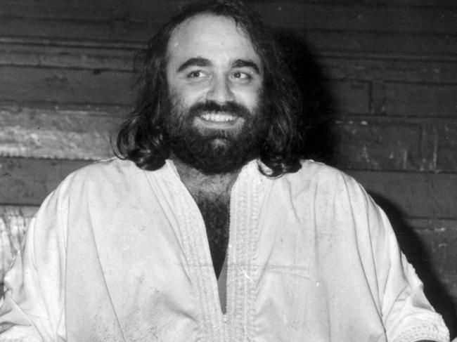 OCTOBER 19, 1976 : Singer Demis Roussos, wearing kaftan, who was presented with silver ercords and a gold cassette for his British sales, at the Royal Albert Hall in London, 19/10/76. Pic Keystone. Roussos/Singer P/