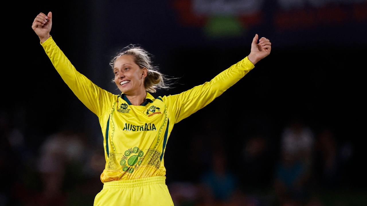 Australia's Ashleigh Gardner celebrates after the dismissal of New Zealand's Eden Carson (not seen) during the Group A T20 women's World Cup cricket match between Australia and New Zealand at Boland Park in Paarl on February 11, 2023. (Photo by Marco Longari / AFP)