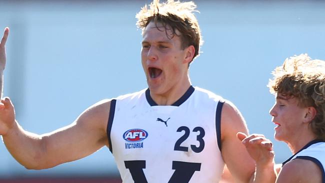 MELBOURNE, AUSTRALIA - JUNE 18: George Stevens of Vic Country (C) celebrates kicking a goal during the 2023 AFL National Championships match between Vic Country and South Asutralia at Ikon Park on June 18, 2023 in Melbourne, Australia. (Photo by Graham Denholm/AFL Photos via Getty Images)