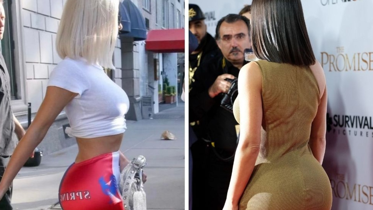 Kim Kardashian shows off famous bum in skintight black leggings