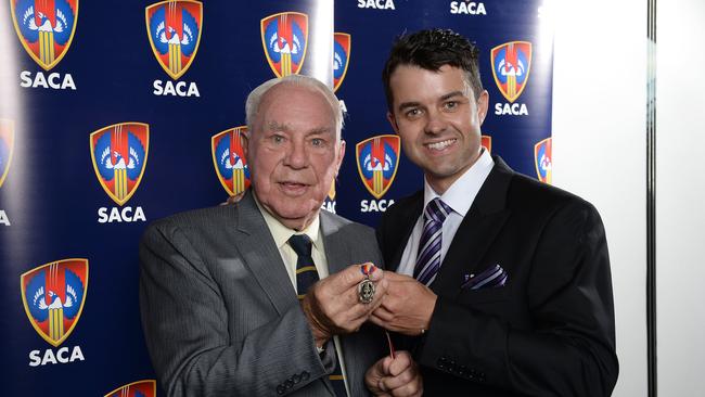 Norwood High old scholar and former state star Neil Dansie (left), presenting the SACA medal named in his honour to Redback Callum Ferguson in 2015. Picture: David Cronin