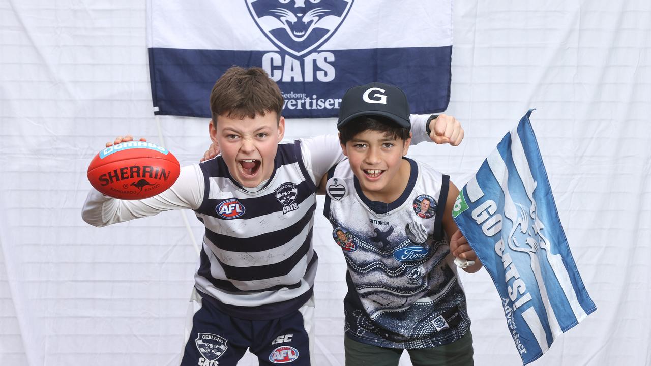 Cats fans Digby Wills, 12 and Kalani Dale, 11, get ready to cheer on the Cats ahead of the qualifying final against Port Adelaide. Picture: Alison Wynd