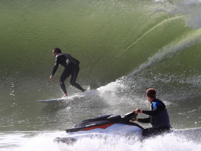 The big surf continues to delight surfers at Currumbin Alley on the Gold Coast. Pics Adam Head