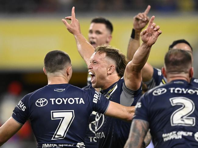 Reuben Cotter celebrates his match-winning try. Picture: Ian Hitchcock/Getty Images