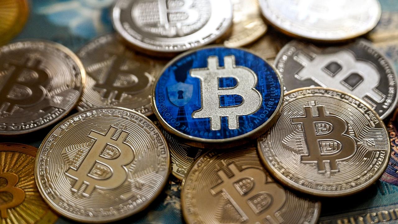 Bitcoin is now being held by financial services companies such as AMP. Picture: AFP