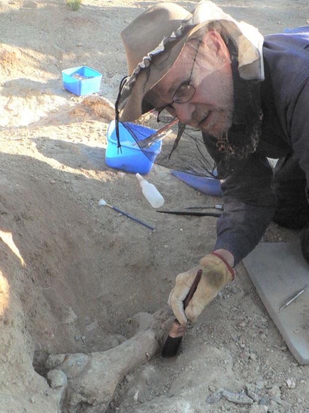 Warren Handley with a dromornis bone. Picture: Supplied