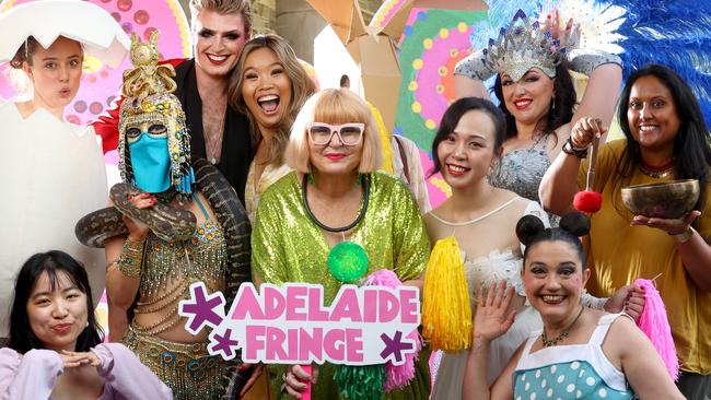 Adelaide Fringe director Heather Croall with some of the colourful characters who make our city the place to be in February and March. Picture: Kelly Barnes