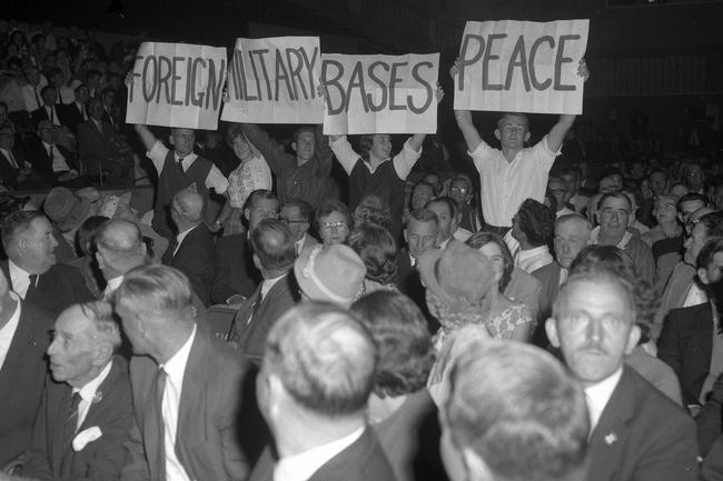 Protesters in the crowd of 3000 at Festival Hall where Prime Minister Sir Robert Menzies was speaking in April 1963. Picture: Noel Pascoe